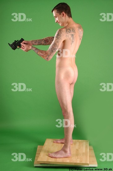 Whole Body Man Pose with pistol White Tattoo Nude Underweight Male Studio Poses