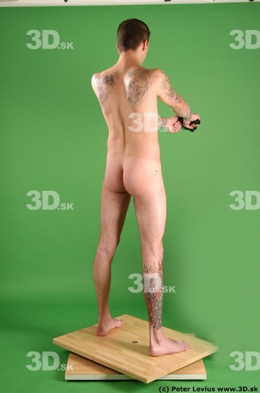 Whole Body Man Pose with pistol White Tattoo Nude Underweight Male Studio Poses