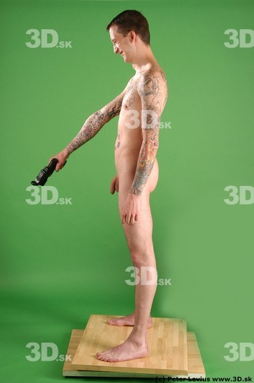 Whole Body Man Pose with pistol White Tattoo Nude Underweight Male Studio Poses