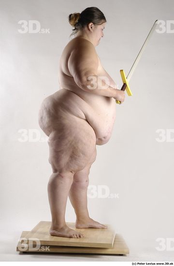 Whole Body Woman Pose with sword Nude Overweight Studio photo references