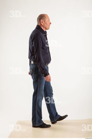 Walking pose blue deep shirt jeans of Ed