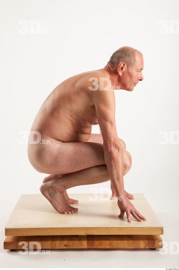 Kneeling pose of nude Ed