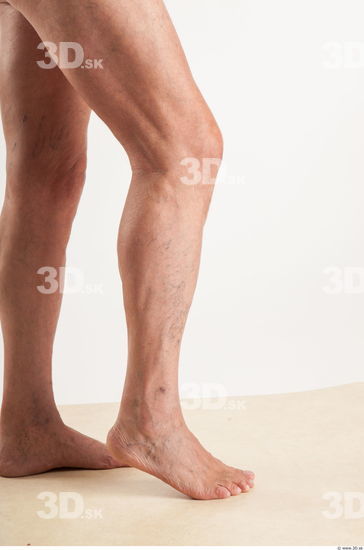 Calf moving pose of nude Ed