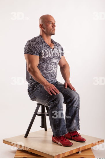 Sitting reference jeans tshirt of Sebastian