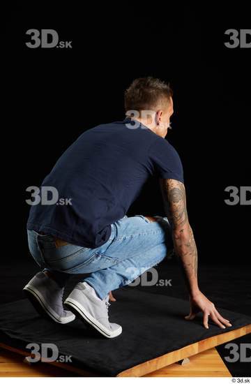 Whole Body Man White Shirt Jeans Athletic Kneeling Studio photo references