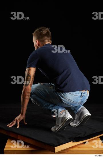 Whole Body Man White Shirt Jeans Athletic Kneeling Studio photo references