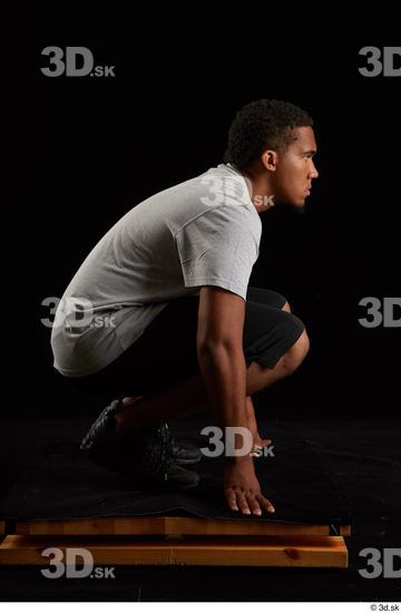 Whole Body Man Black Average Kneeling Studio photo references