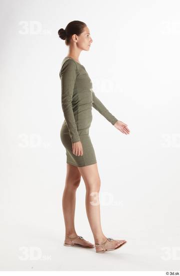 Vanessa Angel  casual dressed green long sleeve dress side view whole body  jpg