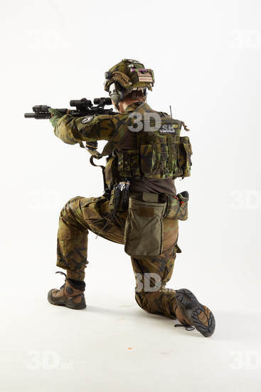 Weapons-Rifle Man Pose with machine rifle White Uniform Athletic Studio photo references