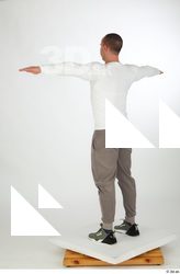 Joel dressed green sneakers grey jogger pants sports standing t-pose…