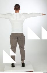 Joel dressed green sneakers grey jogger pants sports standing t-pose…