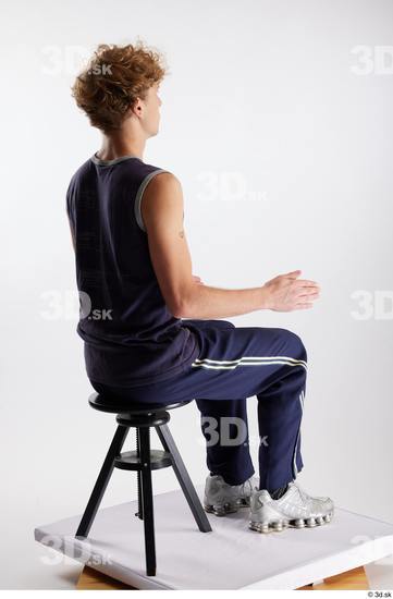 Whole Body Man White Sports Pants Slim Sitting Top Studio photo references