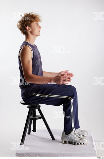 Whole Body Man White Sports Pants Slim Sitting Top Studio photo references