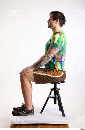 Whole Body Man White Casual Shorts Average Parrot Sitting Studio photo references