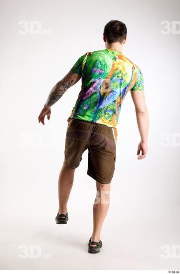 Whole Body Back Man White Casual Shorts Average Parrot Walking Studio photo references