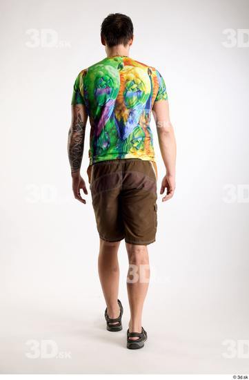 Whole Body Back Man White Casual Shorts Average Parrot Walking Studio photo references