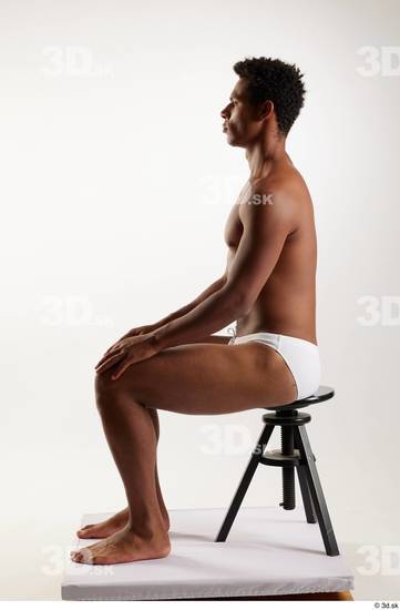 Whole Body Man Black Swimsuit Athletic Sitting Studio photo references