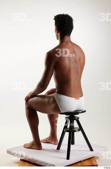 Whole Body Man Black Swimsuit Athletic Sitting Studio photo references