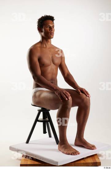 Whole Body Man Black Swimsuit Athletic Sitting Studio photo references