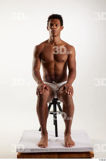 Whole Body Man Black Swimsuit Athletic Sitting Studio photo references