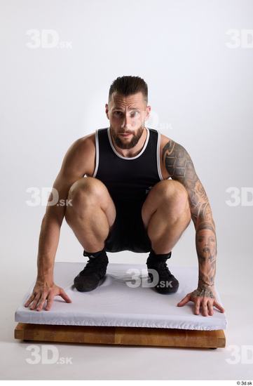 Whole Body Man White Sports Shorts Slim Athletic Kneeling Top Studio photo references