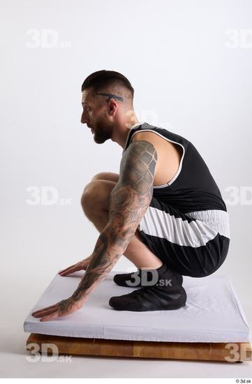 Whole Body Man White Sports Shorts Slim Athletic Kneeling Top Studio photo references