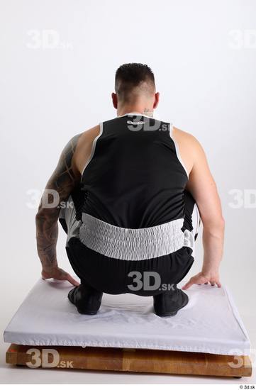 Whole Body Man White Sports Shorts Slim Athletic Kneeling Top Studio photo references