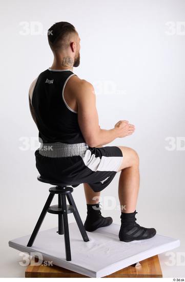 Whole Body Man White Sports Shorts Slim Athletic Sitting Top Studio photo references