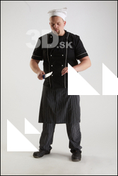  Clifford Doyle Chef Cutting with Knife 
