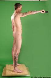 Whole Body Man Pose with pistol White Tattoo Nude Underweight Male Studio Poses