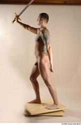 Whole Body Man Pose with sword Tattoo Nude Slim Studio photo references